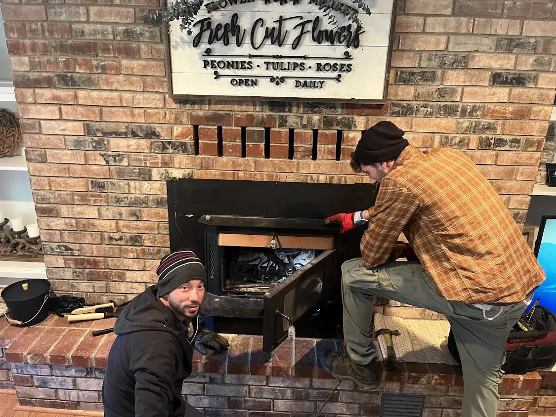 ABC Chimney Fireplace Services certified technician performing a chimney inspection in Sacramento CA