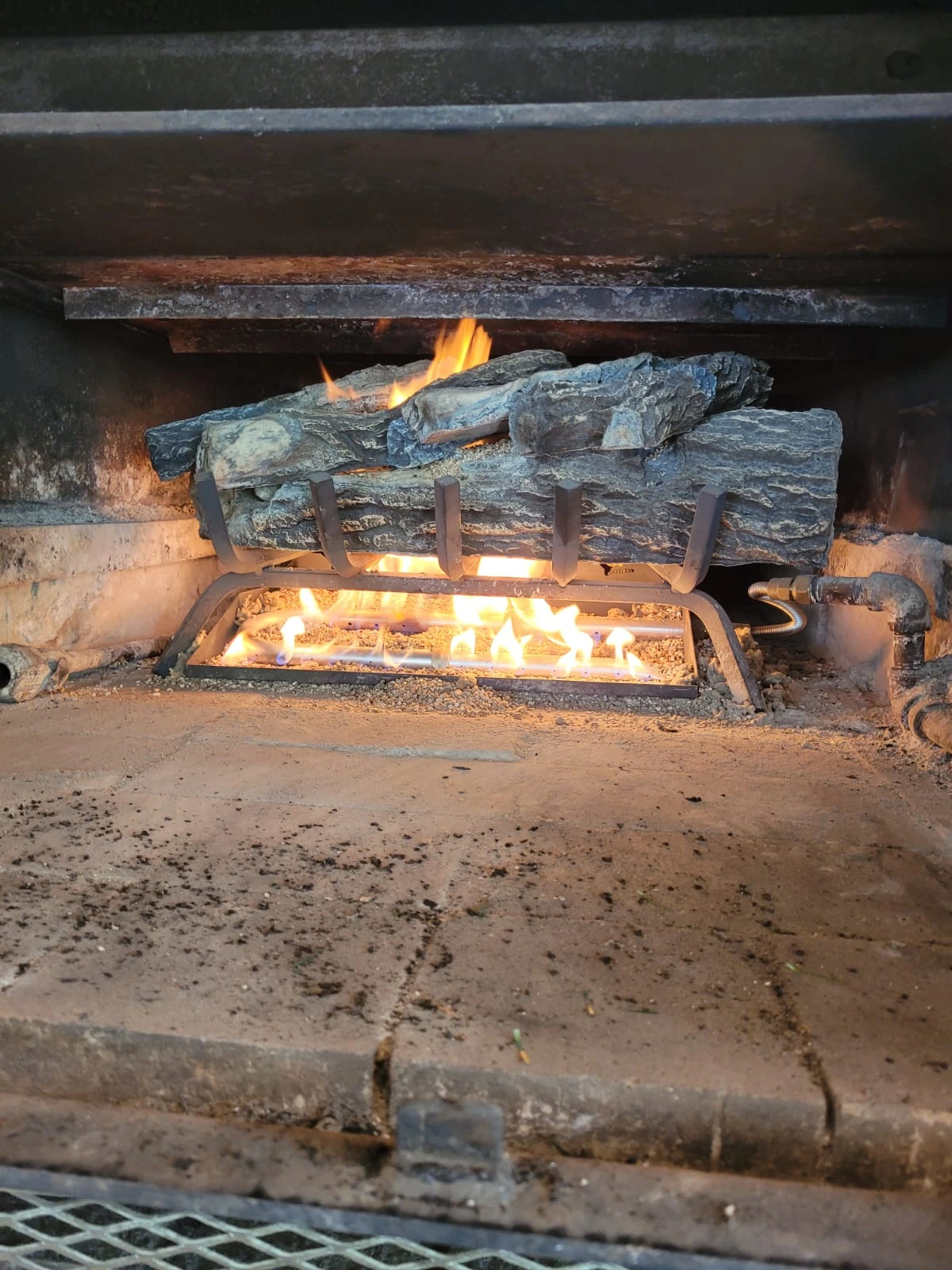 ABC Chimney Fireplace Services certified technician performing fireplace services in Sacramento CA